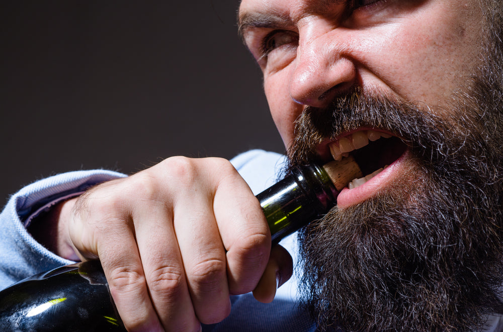 How to Open a Bottle of Wine Without a Corkscrew